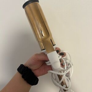 Gold and White Hair Styling Tool